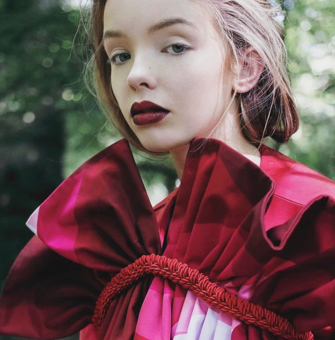 Red dress portrait with bold lips
